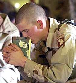 Soldier praying