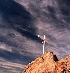 White cross on a hill